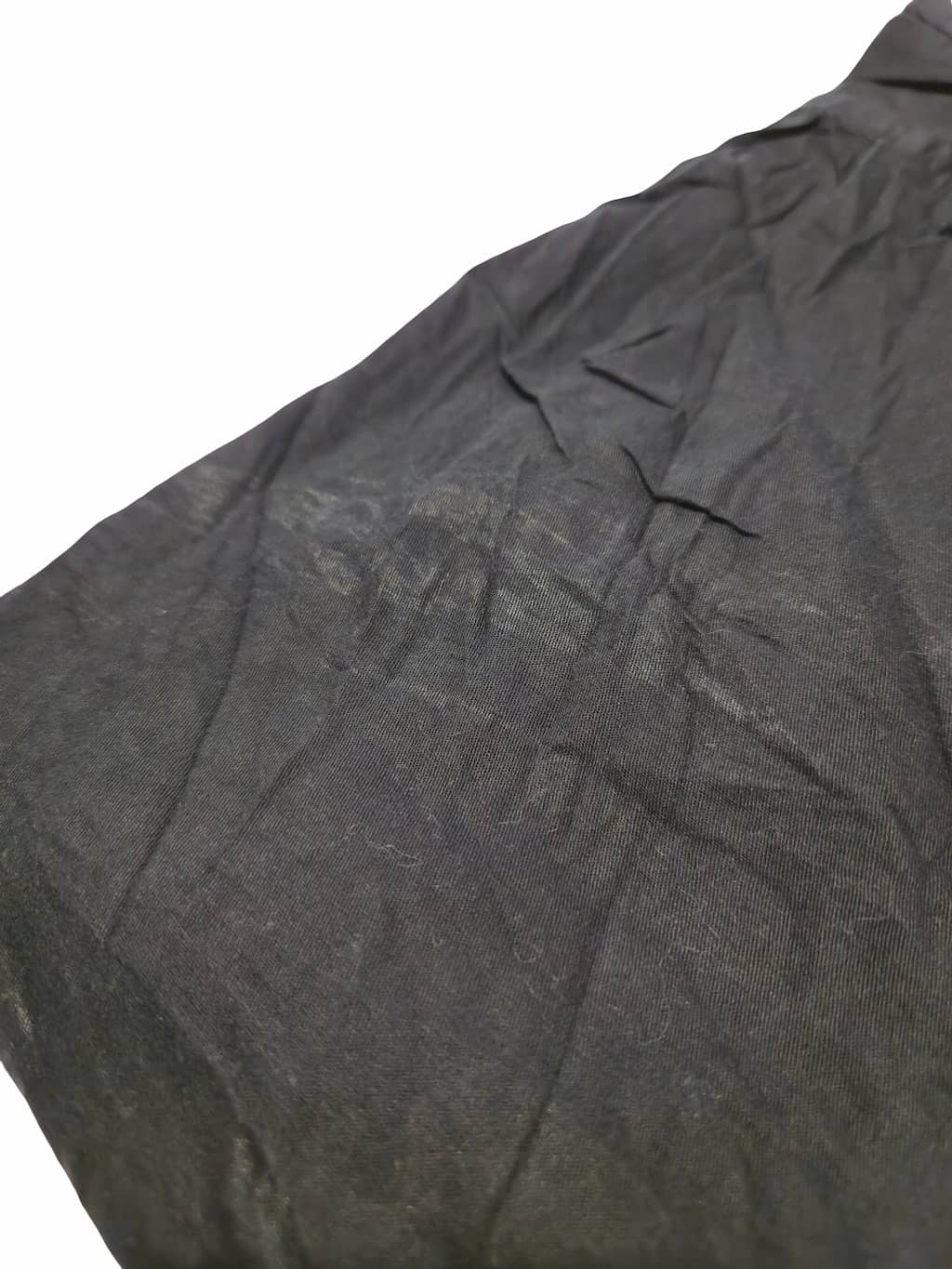 Détail zoomé d'un défaut sur une chemise Wrangler issu d'un lot Grade B.