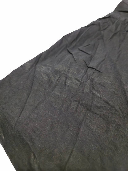 Détail zoomé d'un défaut sur une chemise Wrangler issu d'un lot Grade B.