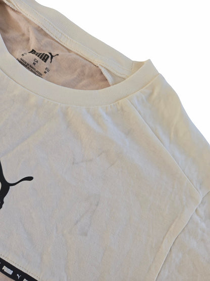 Détail d'un défaut sur un haut de marque issu d'un lot Grade B.