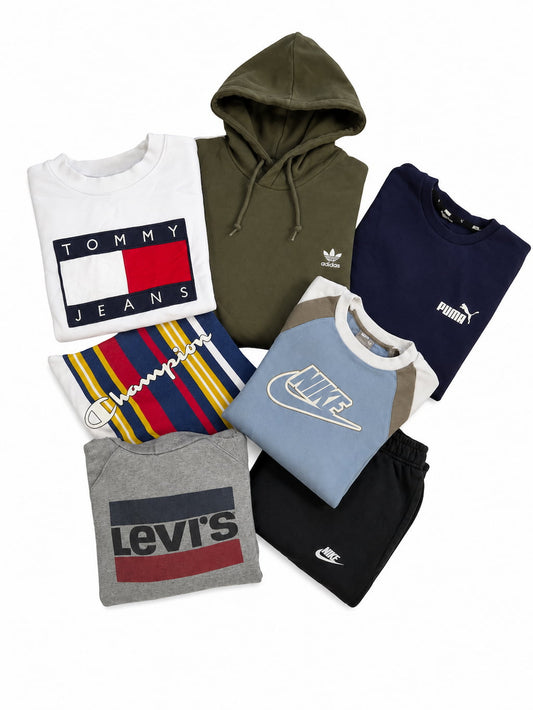 Lot de sweats et pulls de marque de seconde main pliés en qualité Grade A pour la revente.