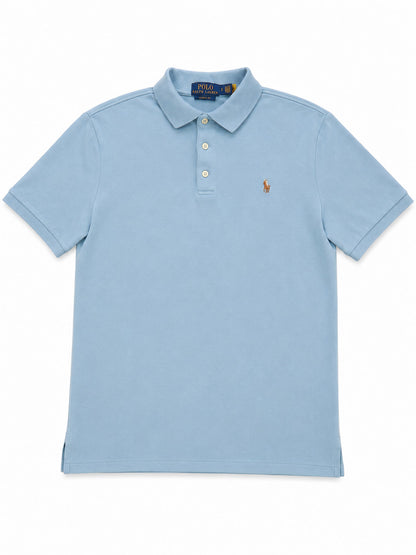 Polo Ralph Lauren bleue clair de seconde main plié en parfaite condition Grade A pour revendeurs.