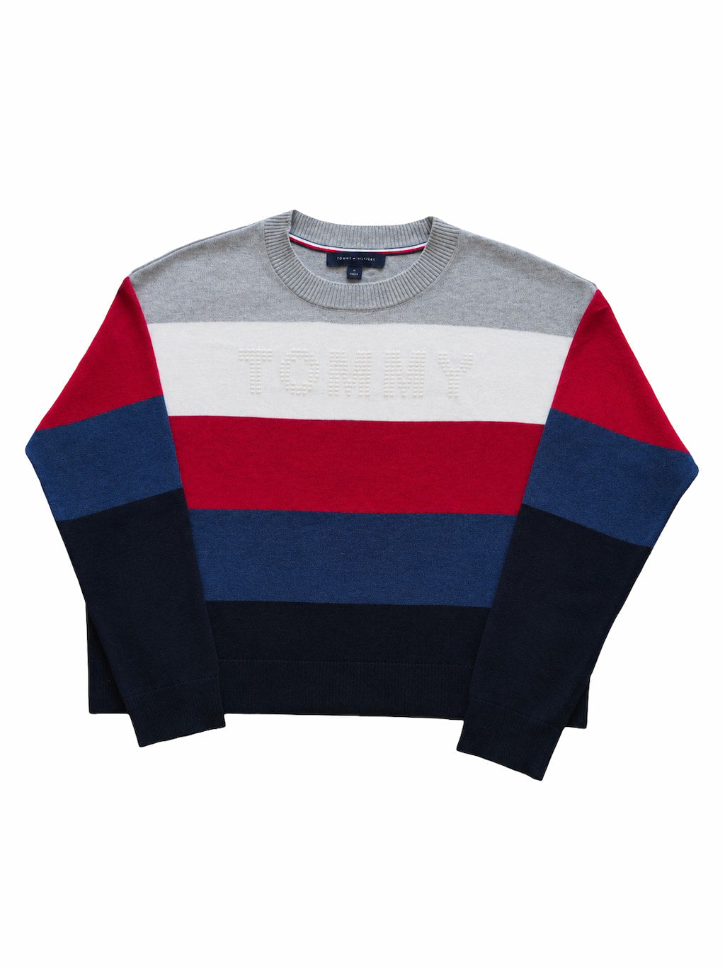 Pull Tommy Hilfiger rayé multicolore de seconde main plié en parfaite condition Grade A pour revendeurs.
