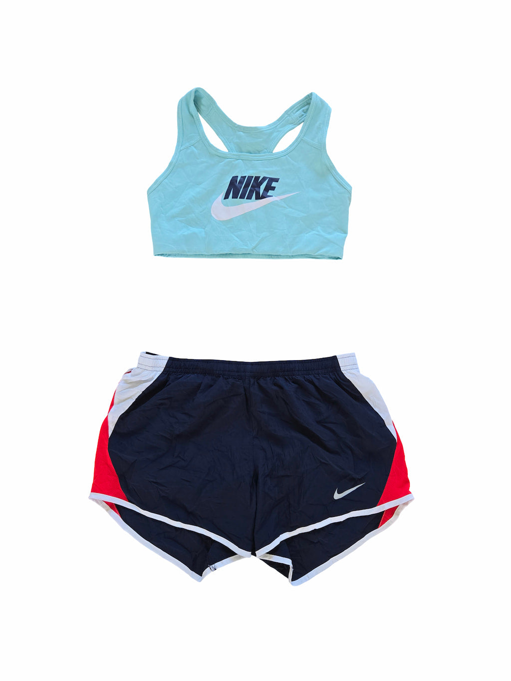 Vêtements du lot Nike sport femme de seconde main pliés en parfaite condition Grade A pour revendeurs.